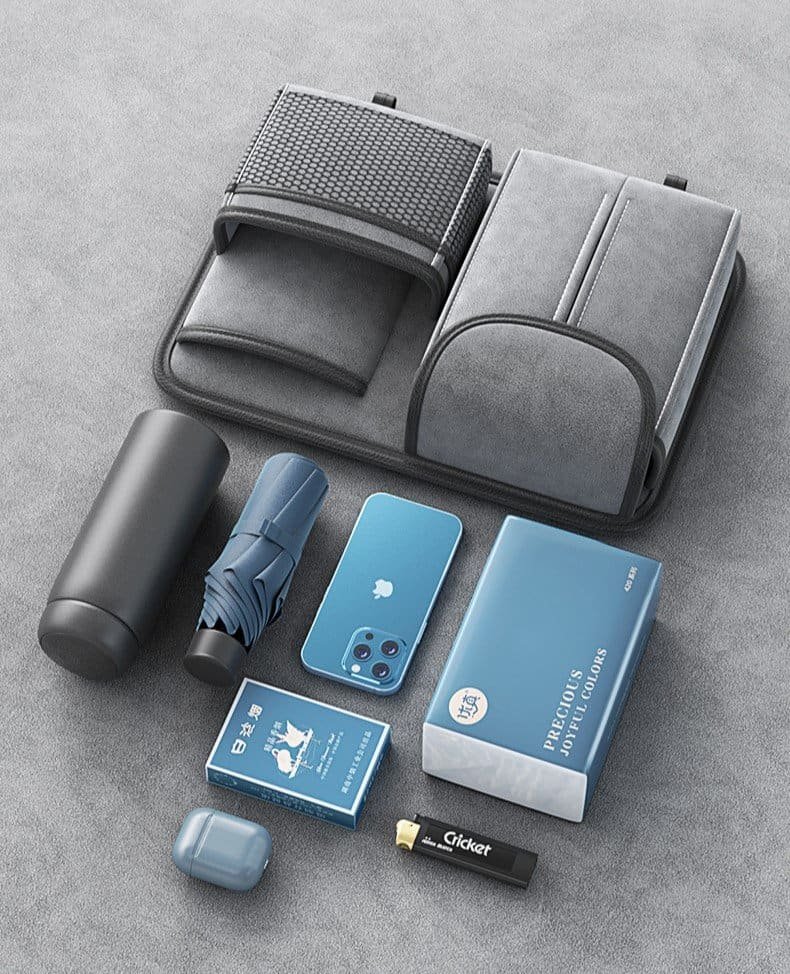Clean gray travel bag with tech accessories and essentials for organized packing.