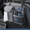 Front seat car organizer with tissue, phone and bottle storage, ideal for travel efficiency.
