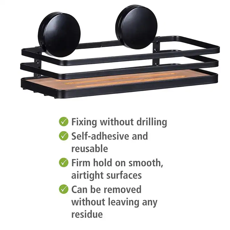 Vacuum suction bathroom shelf holding shampoo and soap bottles