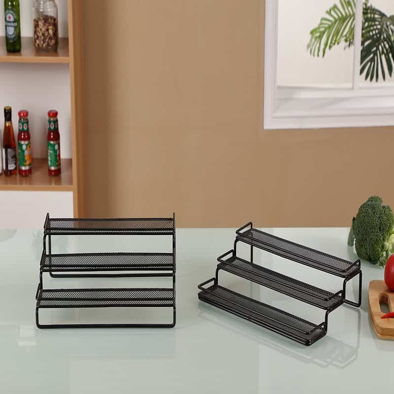 Organizing kitchen or office supplies with black metal desktop file holders.