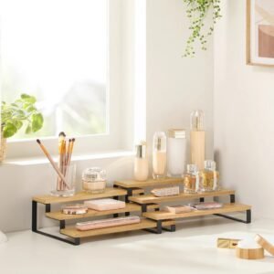 Elegant wooden and black metal jewelry display shelf with perfume bottles and accessories by Arsi Studio.