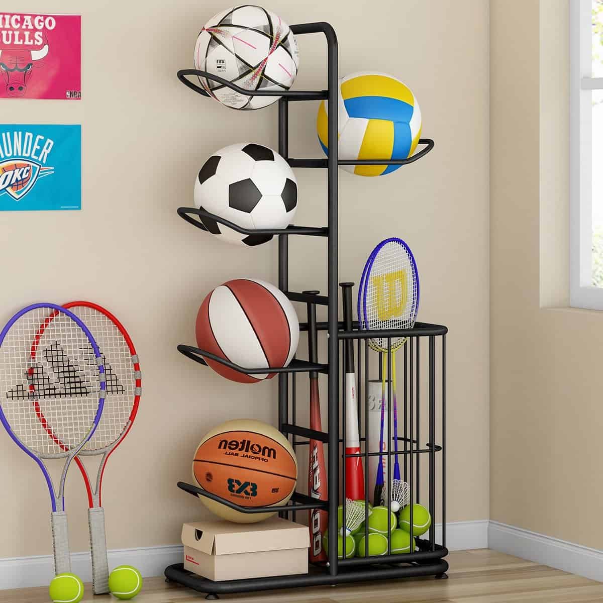 Black ball rack organizer neatly storing footballs and basketballs in a modern room