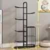 Black ball rack organizer neatly storing footballs and basketballs in a modern room