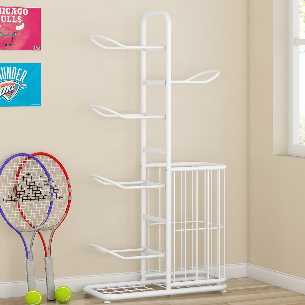 White ball rack organizer neatly storing footballs and basketballs in a modern room