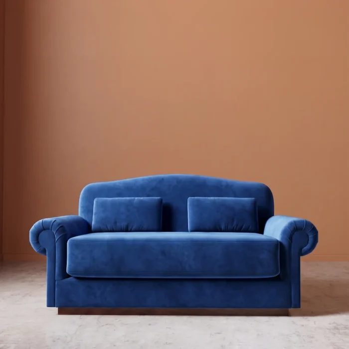 Rajford 2 seater sofa in cobalt blue front view with curved backrest and plush cushions